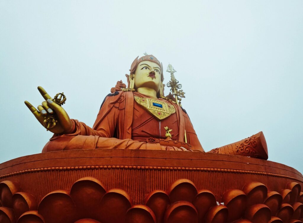 Towering Guru Padmasambhava statue in Namchi, Sikkim, showcasing profound spirituality and intricate artistry.